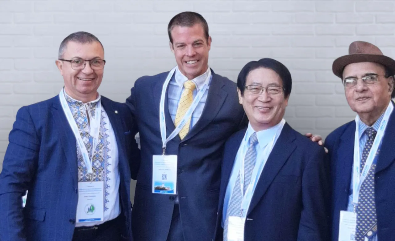 Prof. Oleh Pokotylo in a Ukrainian embroidered shirt with Tyler LeBaron, Shigeo Ohta and Ram B. Singh at the conference, 2022